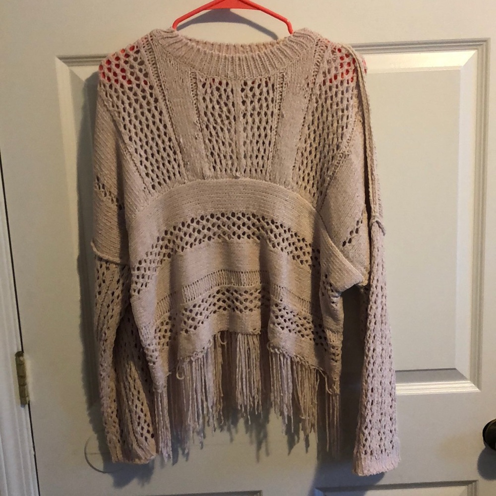 Long sleeve tasseled sweater